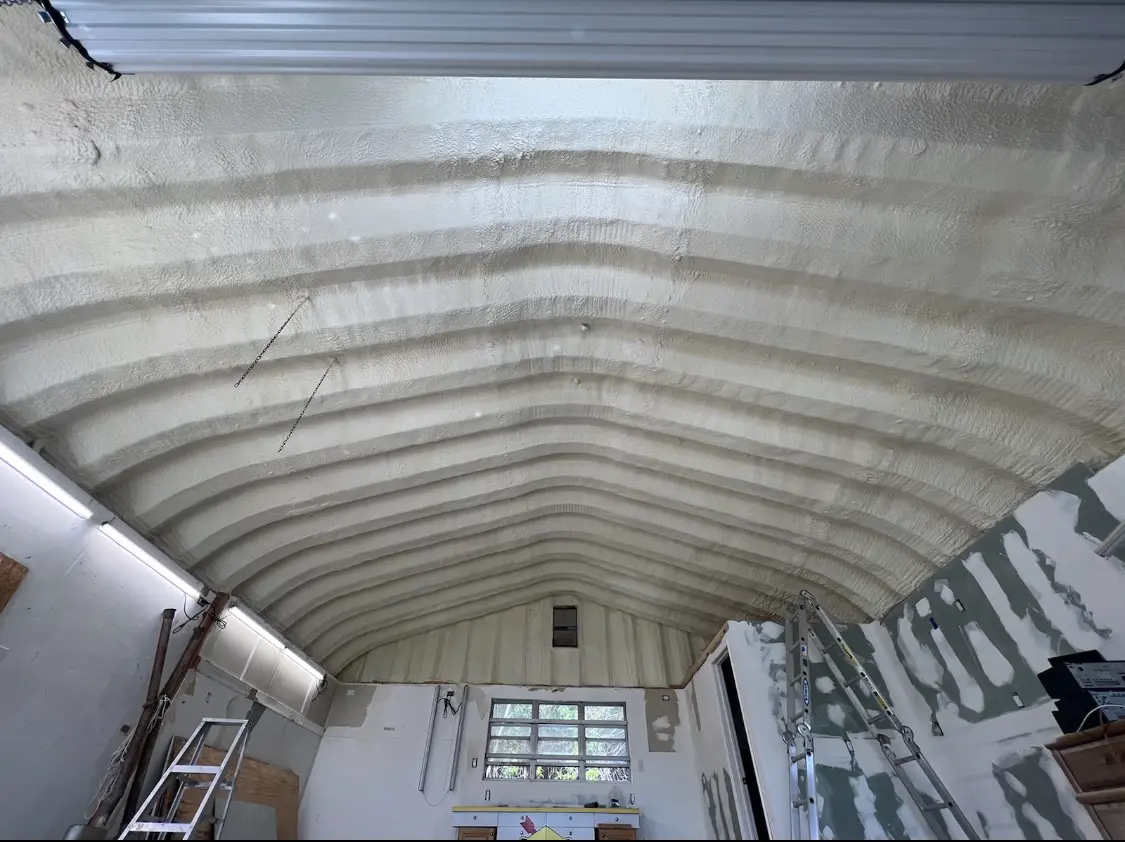 Spray polyurethane foam applied to the underside of a metal roof deck in Rochelle Park